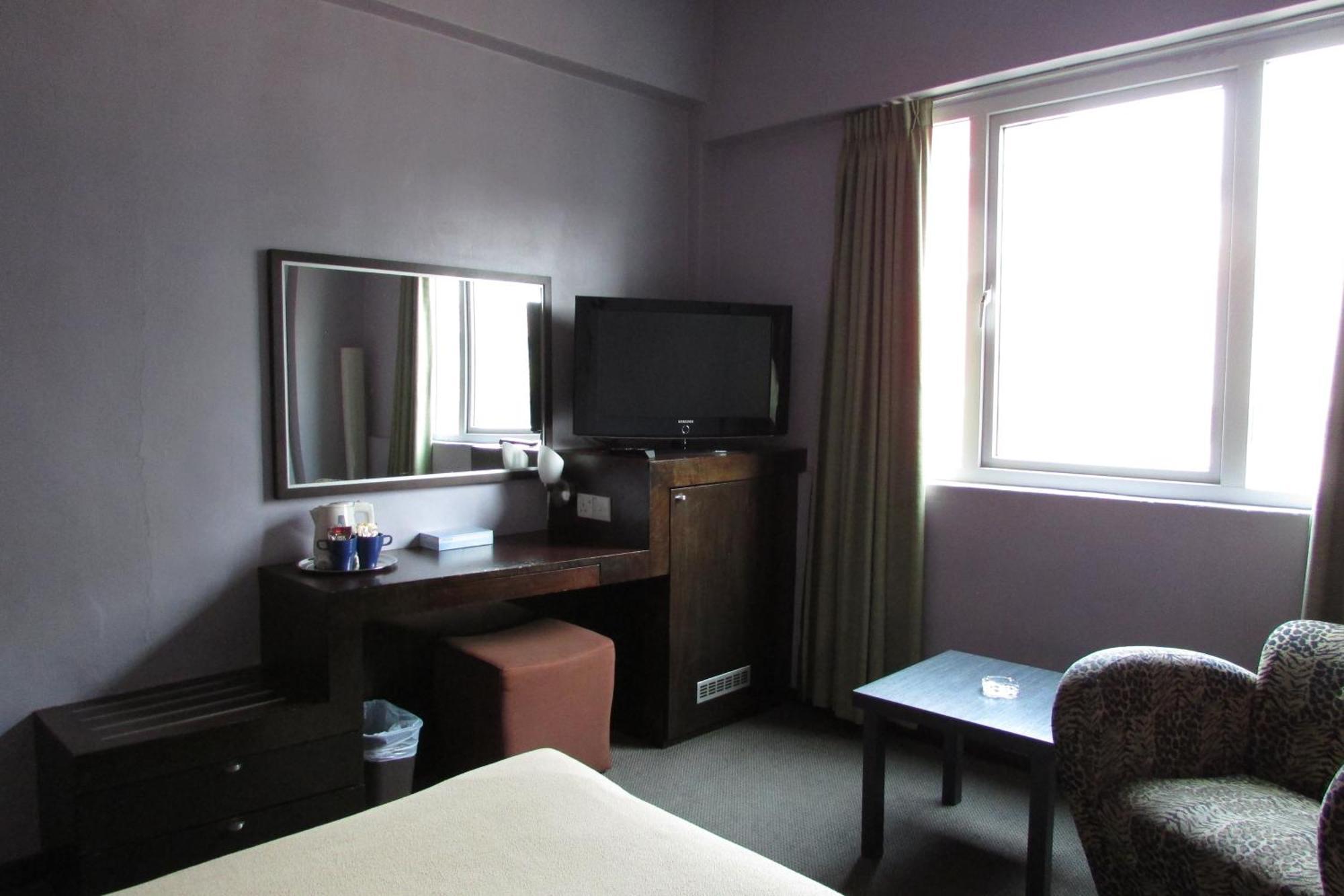 Strand Hotel Сингапур Стая снимка