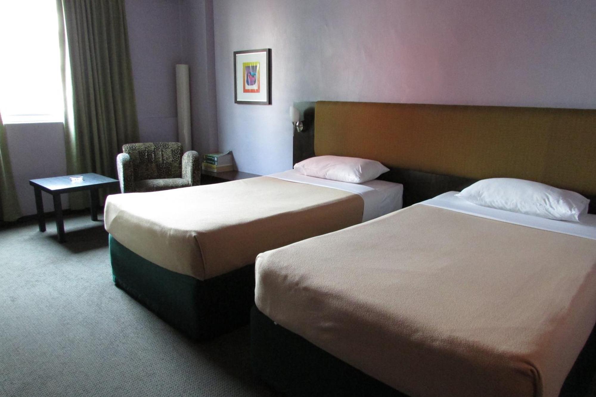 Strand Hotel Сингапур Стая снимка