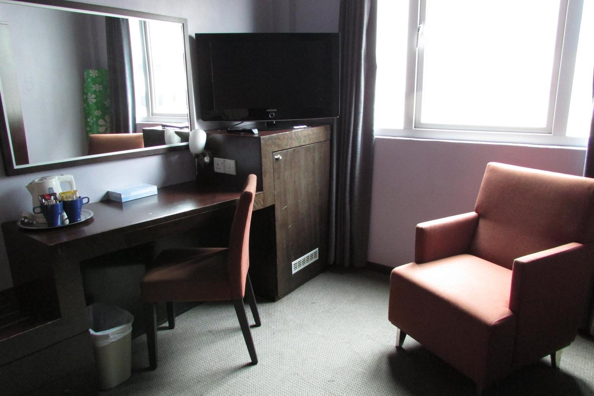 Strand Hotel Сингапур Стая снимка